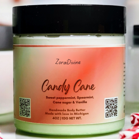 Jar of ZoraiDivine Candy Cane body butter with peppermint candy around the jar