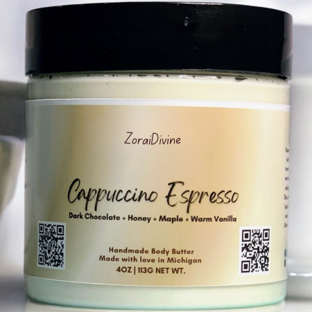 Jar of 'Cappuccino Espresso' body butter  surrounded by a cup.
