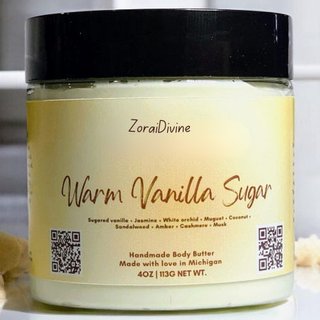 Jar of ZoraDivine Warm Vanilla Sugar body butter with a black lid on a white background.