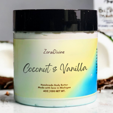 Jar of ZoraiDivine Coconut & Vanilla body butter on a neutral background