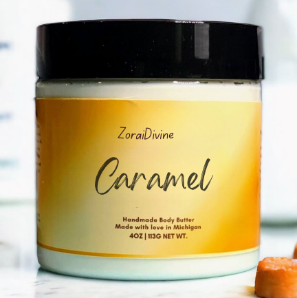 Jar of ZoraiDivine Caramel body butter on a light background