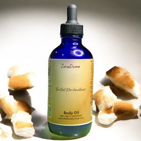 Blue bottle of Toasted marshmallows with marshmallows on a neutral background