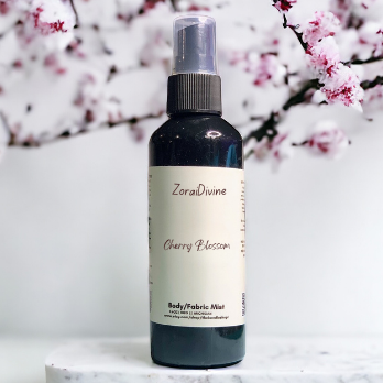 Body mist Cherry Blossom on a white background with cherry blossom flowers