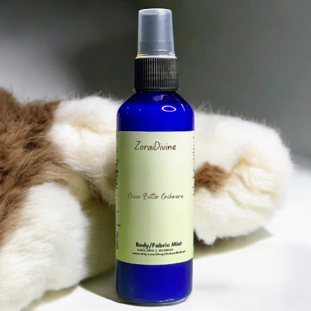 Body mist Cocoa butter cashmere on a white surface