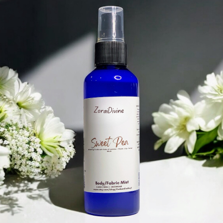 Body mist Sweet Pea with white flowers on a background