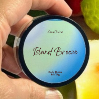 Hand holding a product labeled 'Island Breeze' body butter with fruits in the background