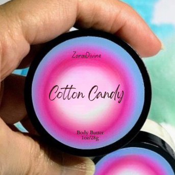 Hand holding a 'Cotton Candy' body butter product with a colorful background
