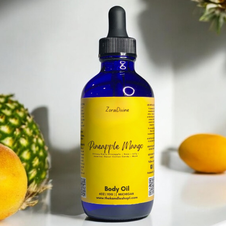 Blue bottle of Pineapple Mango Body oil  on a white background