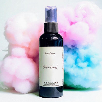 Body mist Cotton candy with cotton candy puffs on a white background.