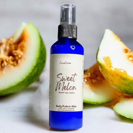 Body mist Sweet melon on a white counter with melon slices on the background.