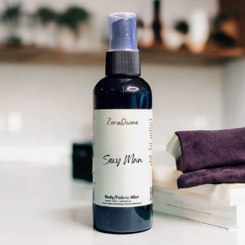 Body mist Sexy man on a white counter.