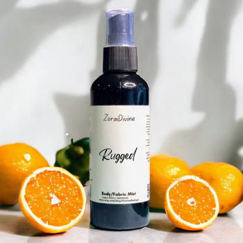 Body mist 'Rugged' with oranges on a light surface